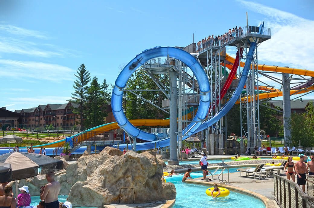 Blue slide with loop and turns Aqualoop at Ramayana Water Park Aqualoop Slide