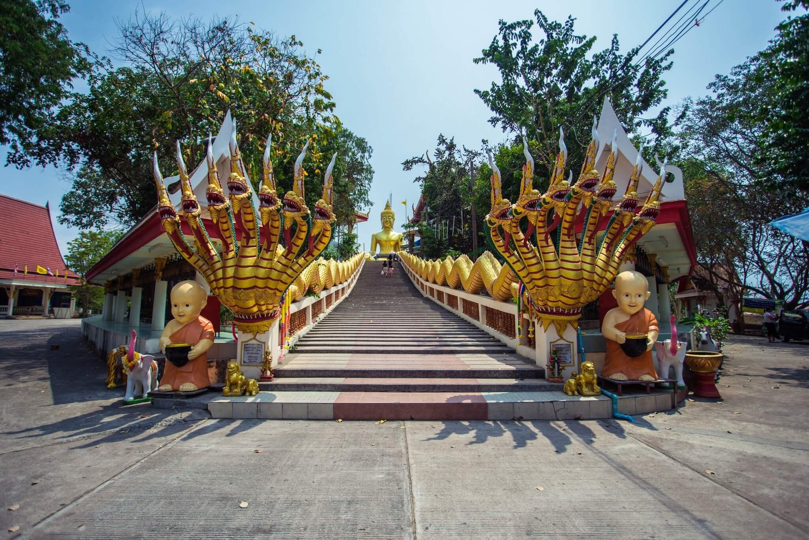A staircase leads to the statue of the Buddha