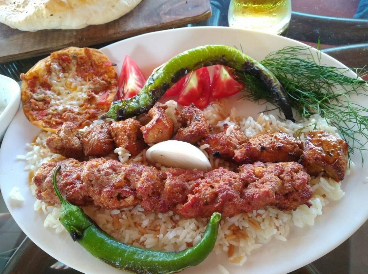Lunch with kebab in one of the cafes of Beldibi village, Turkey Kebab for lunch