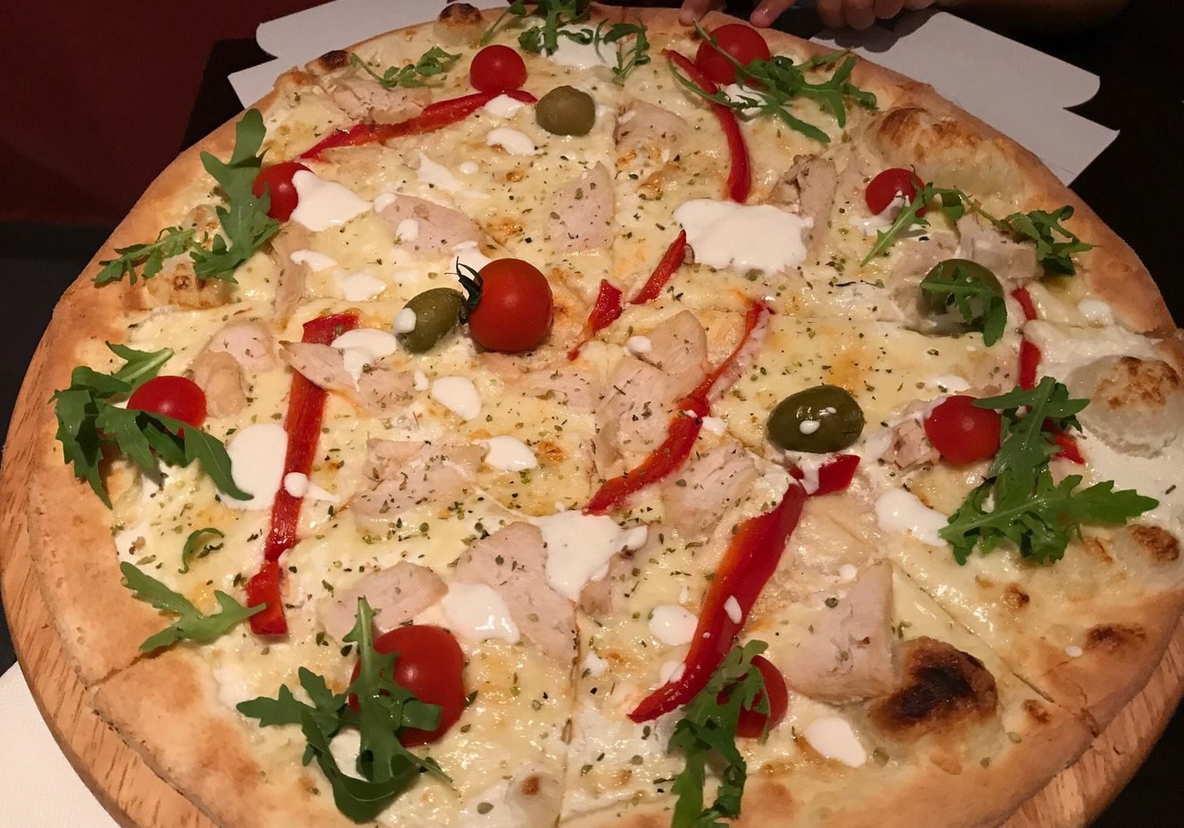 On the photo of pizza from fast food Crazy Pizza This is what pizza looks like in Crazy Pizza