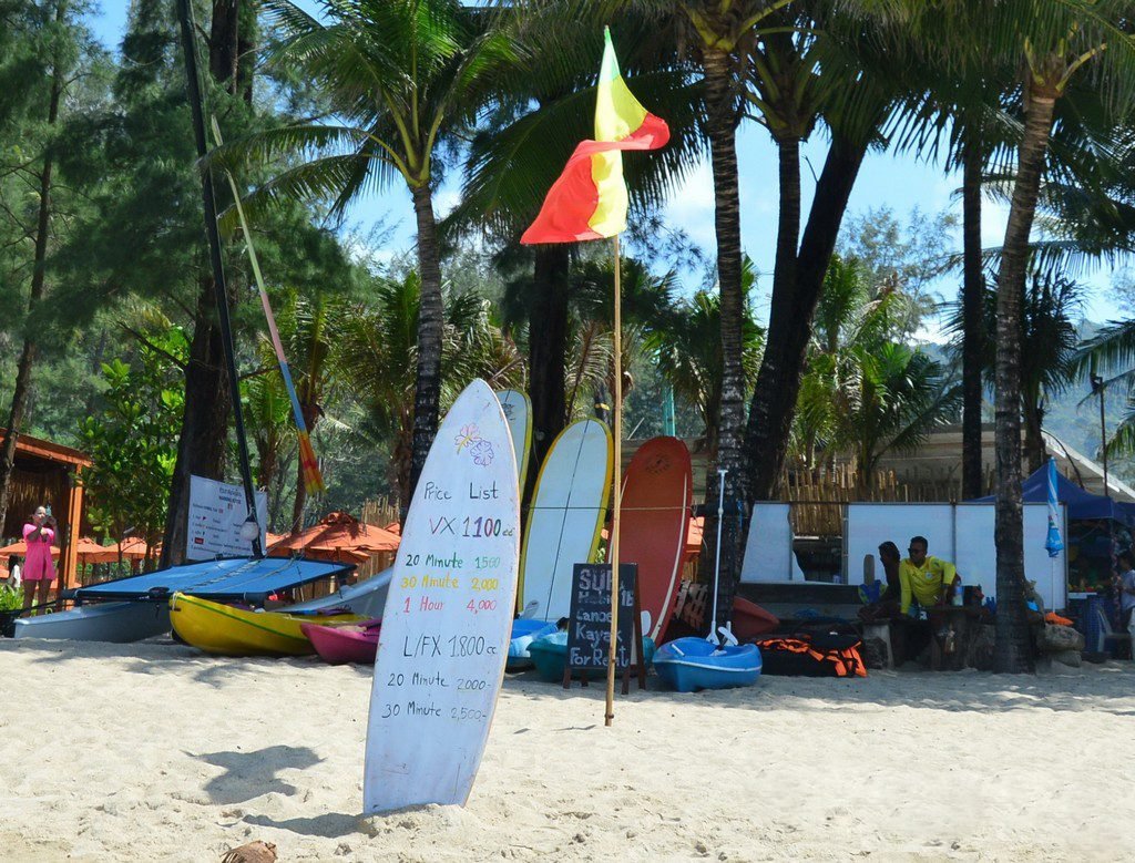 Price list for water activities on a surfboard Kamala Beach Activities