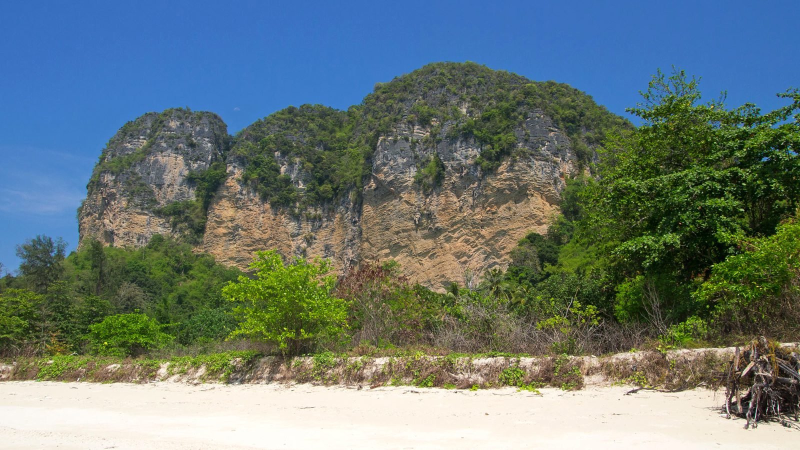Rock and green vegetation in the center of Poda island Picturesque rocks of Poda Island