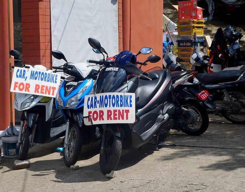 Motorbikes with rental signs Motorbike rental service