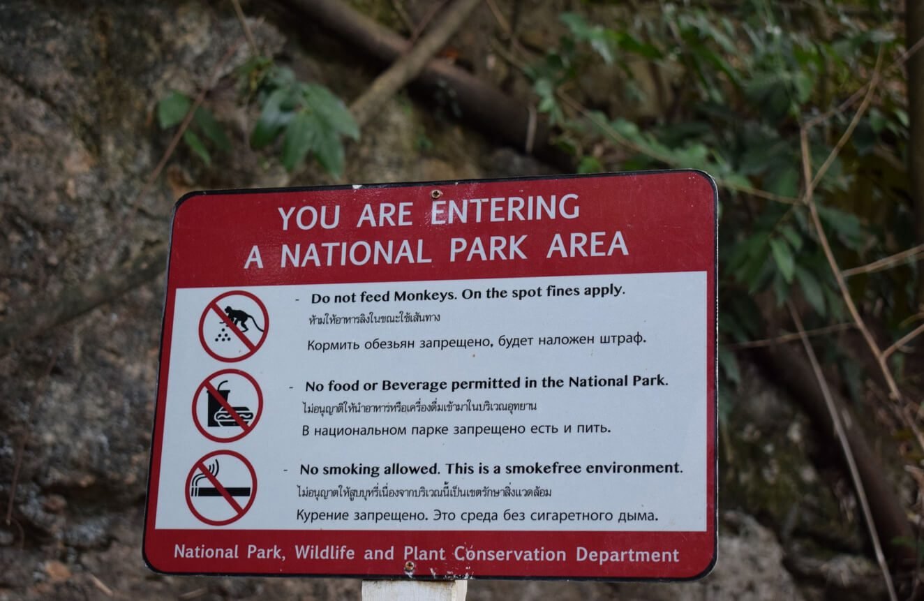 A sign prohibiting feeding monkeys on the monkey trail to Pai Plong Beach It is forbidden to feed monkeys here
