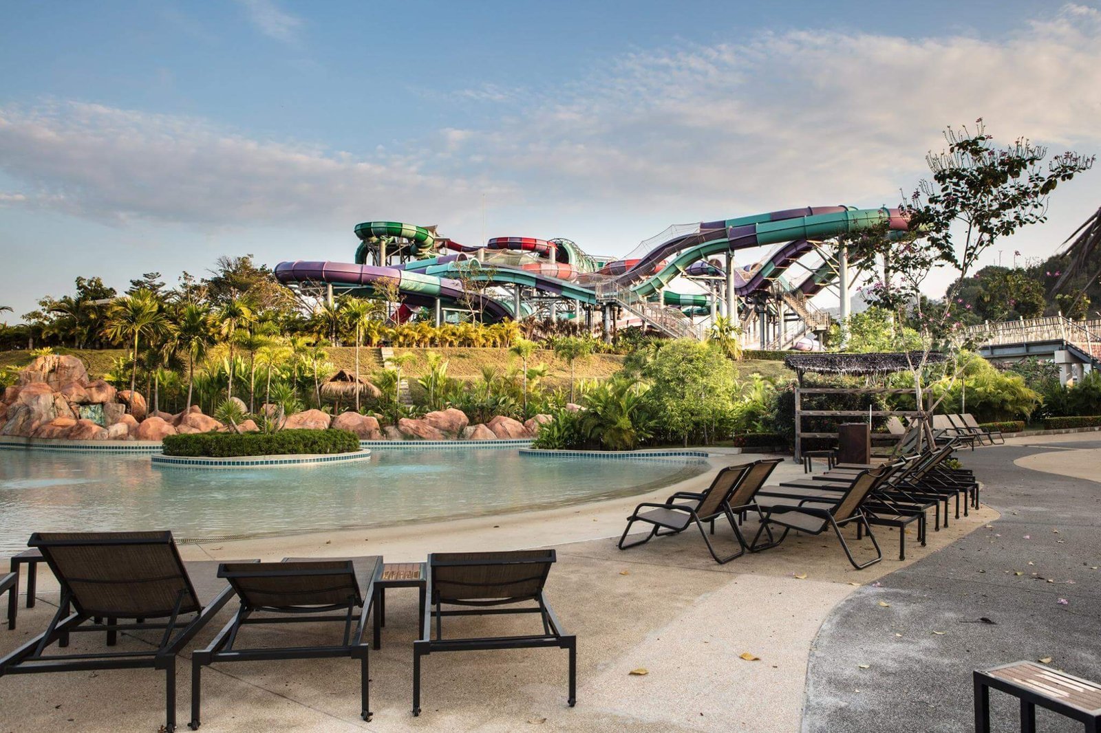 Sun loungers by the pool in the Ramayana Water Park Ramayana Water Park Lounge Chairs