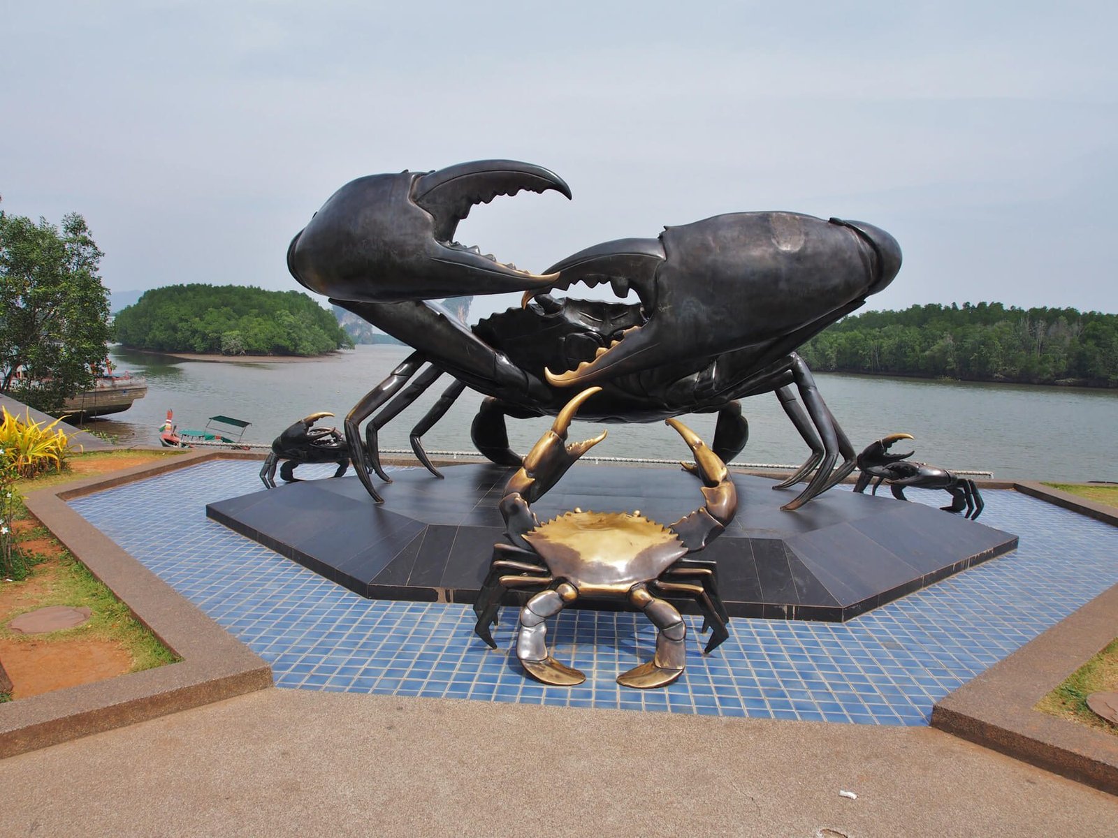 Sculpture of big and small crabs on the waterfront of Krabi town Big and small crabs
