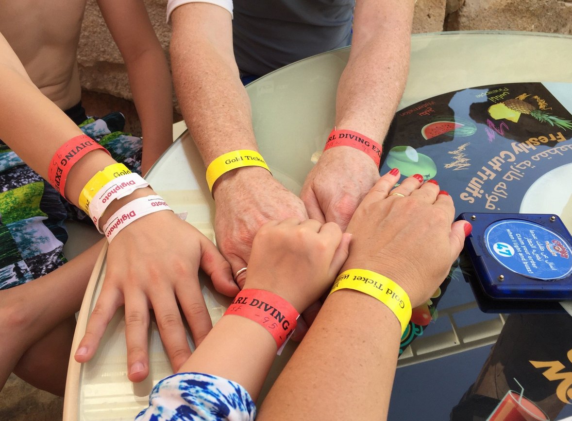 Photos of colorful Yas WaterWorld water park ticket ribbons Yas WaterWorld tickets