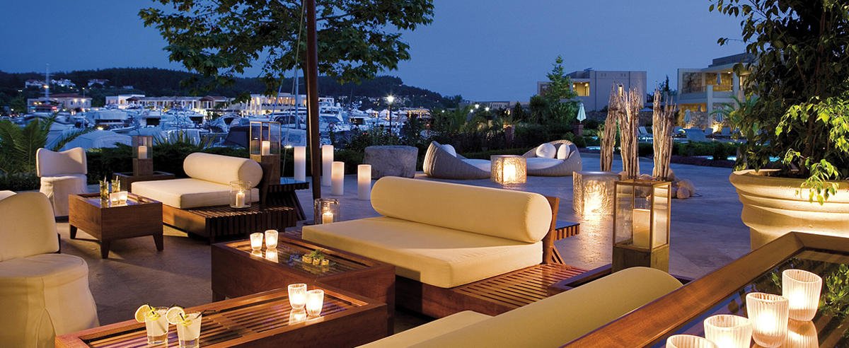 Photo at a restaurant along the Sani Marina boardwalk Evening at a restaurant along the boardwalk