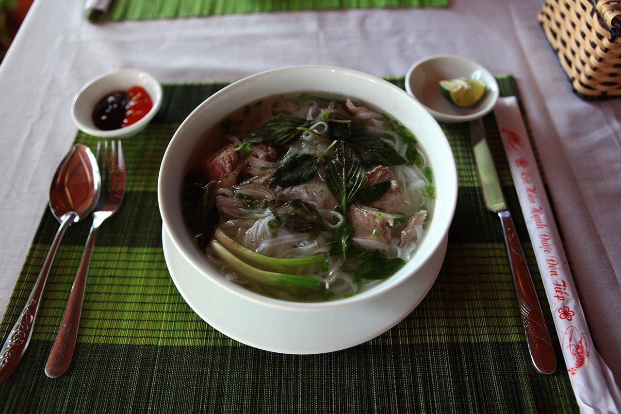 Pictured is pho bo Vietnamese soup Pho bo Vietnamese soup