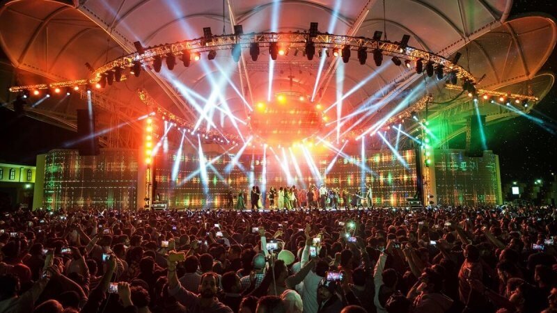 Photo: people at the Global Village concert in Dubai Global Village Concert