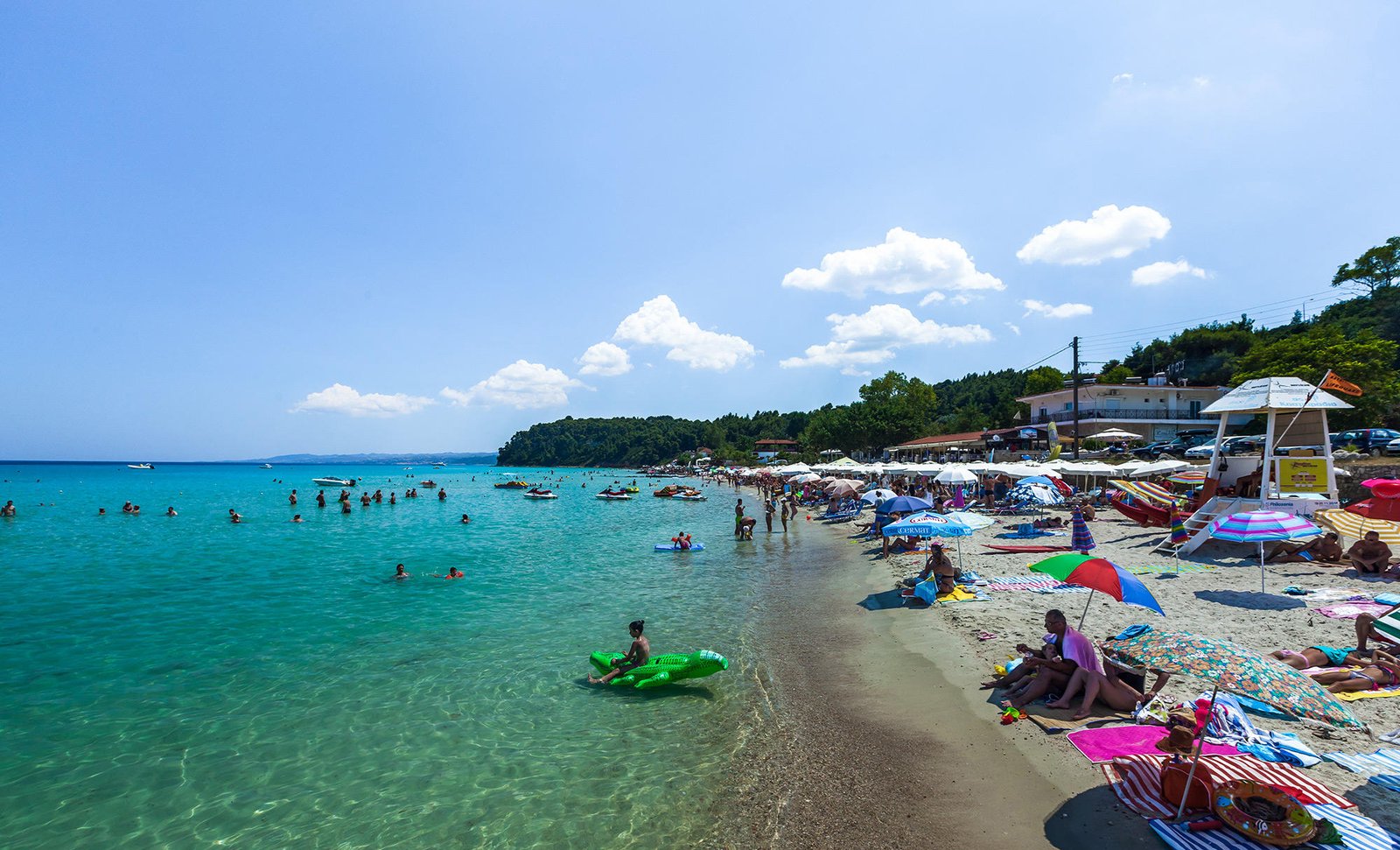 Vacationers on the beach of the resort of Kallithea on the east coast of Rhodes Kalithea Beach