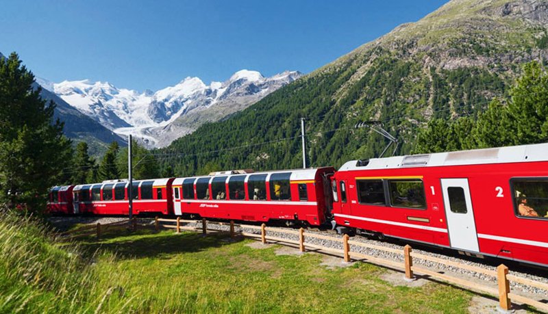 Photo of the red train to Lugano By train to Lugano