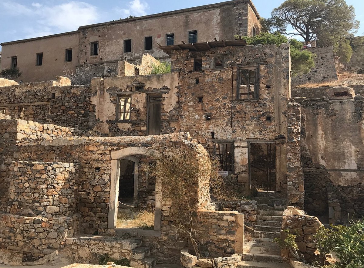 Abandoned buildings on the island of Spinalonga in Crete Ruins of buildings