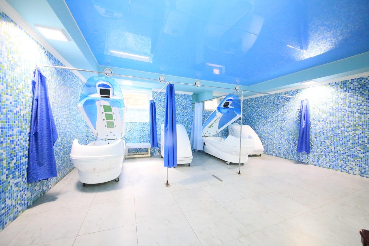A room with special indoor baths for radiation treatments at Borjomi Palace Hotel Water Treatment room