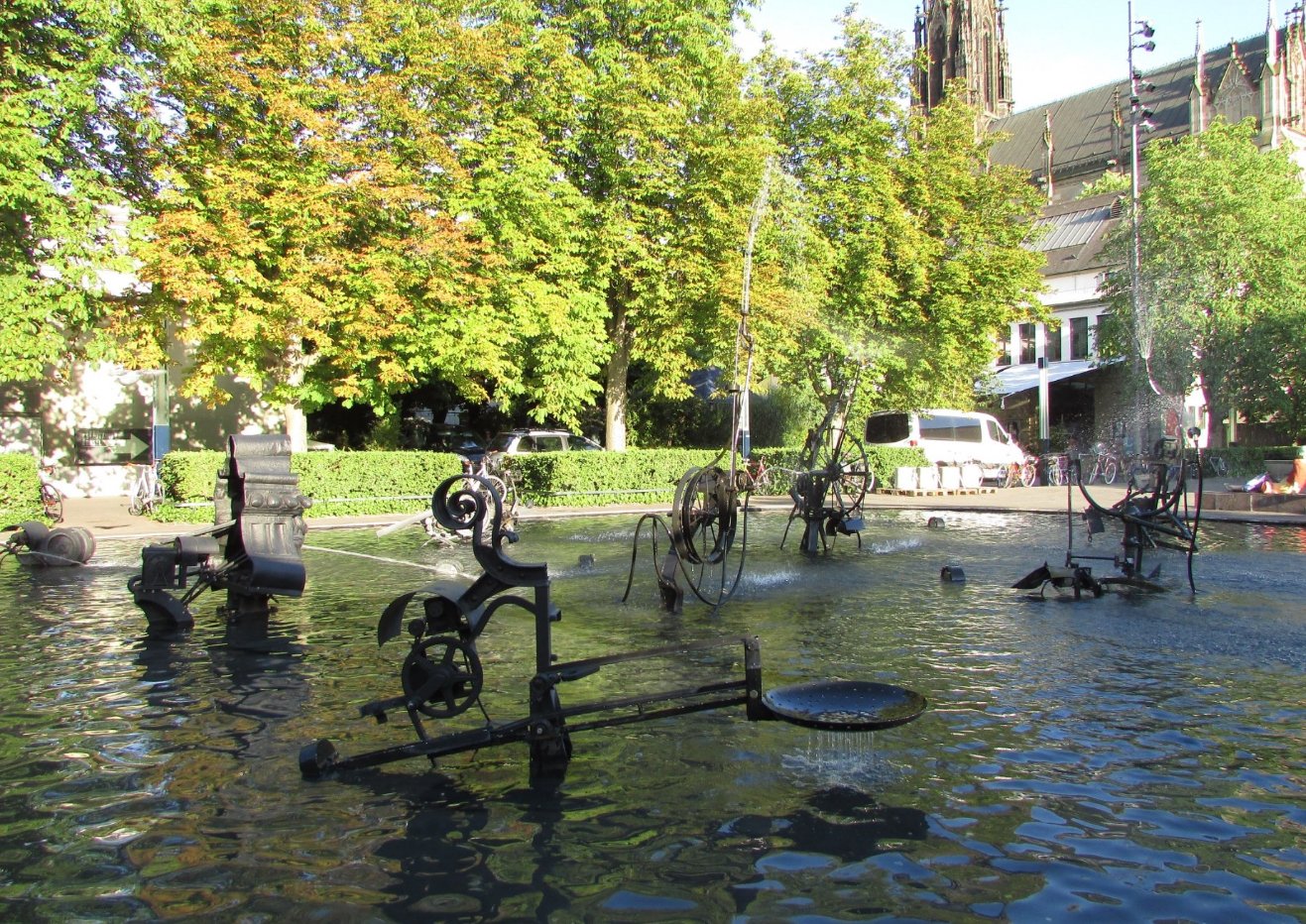 Photo of a fountain with kinetic metal sculptures Fountain with kinetic sculptures