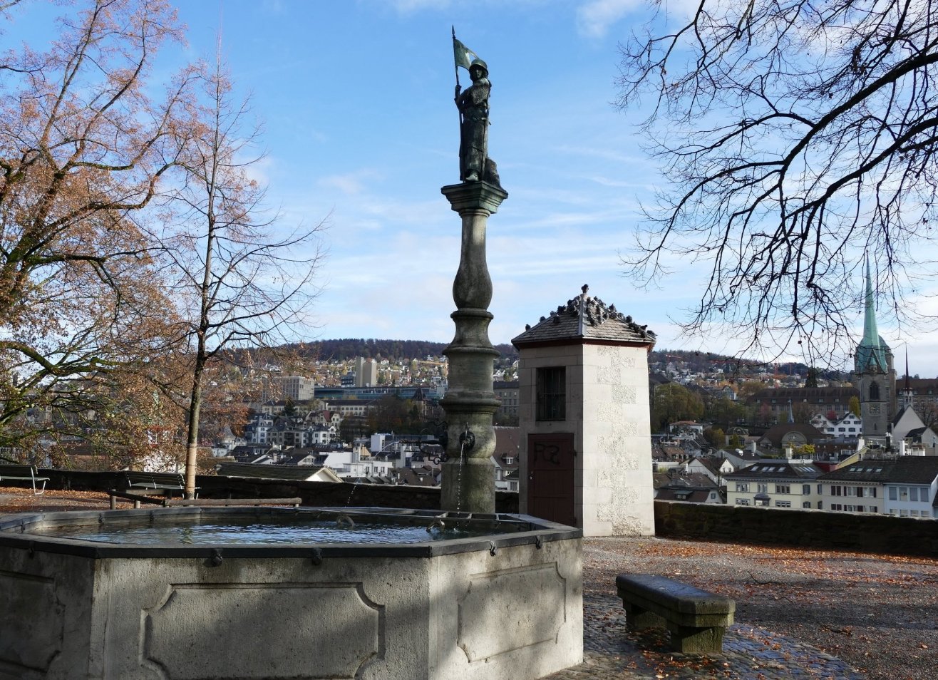 Ancient fountain with a statue of the Warrior Maiden Fountain with a statue of the warrior Maiden