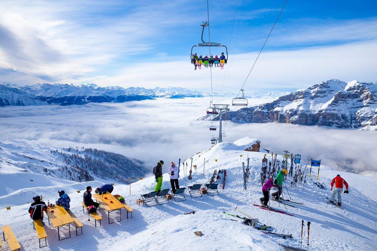 Photos of skiers and ski lifts Mountain skiing