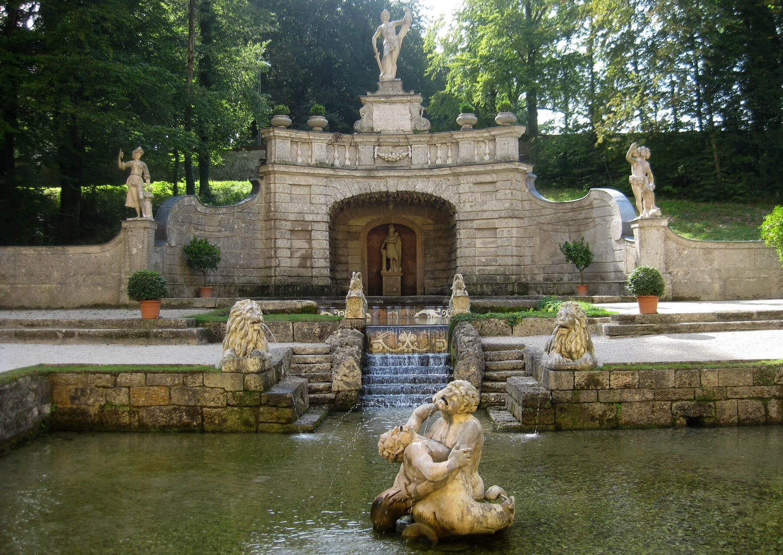 Fountain sculptures in the park of the Helbrunn Palace Fountains in the park