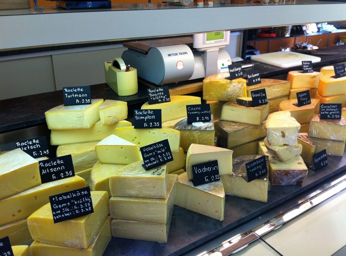 Photo of cheese in the window of the family shop La Ferme Gemmet La Ferme Gemmet Family Shop
