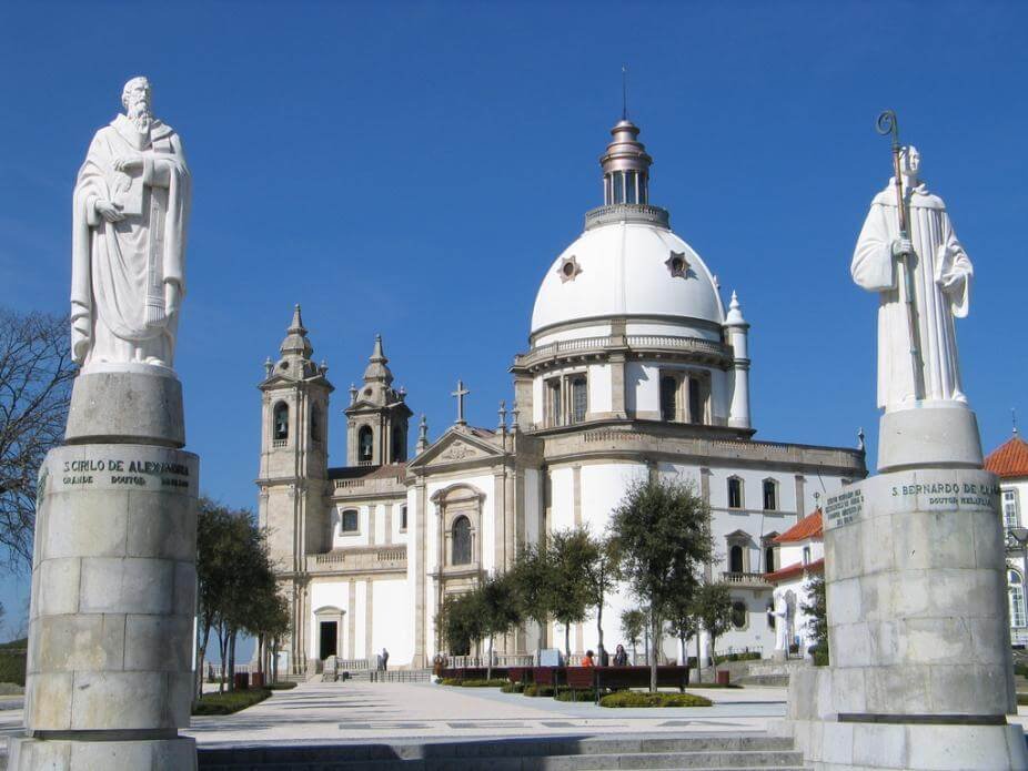 Sameiro Sanctuary with statues of saints flanking the entrance Side facade of the temple