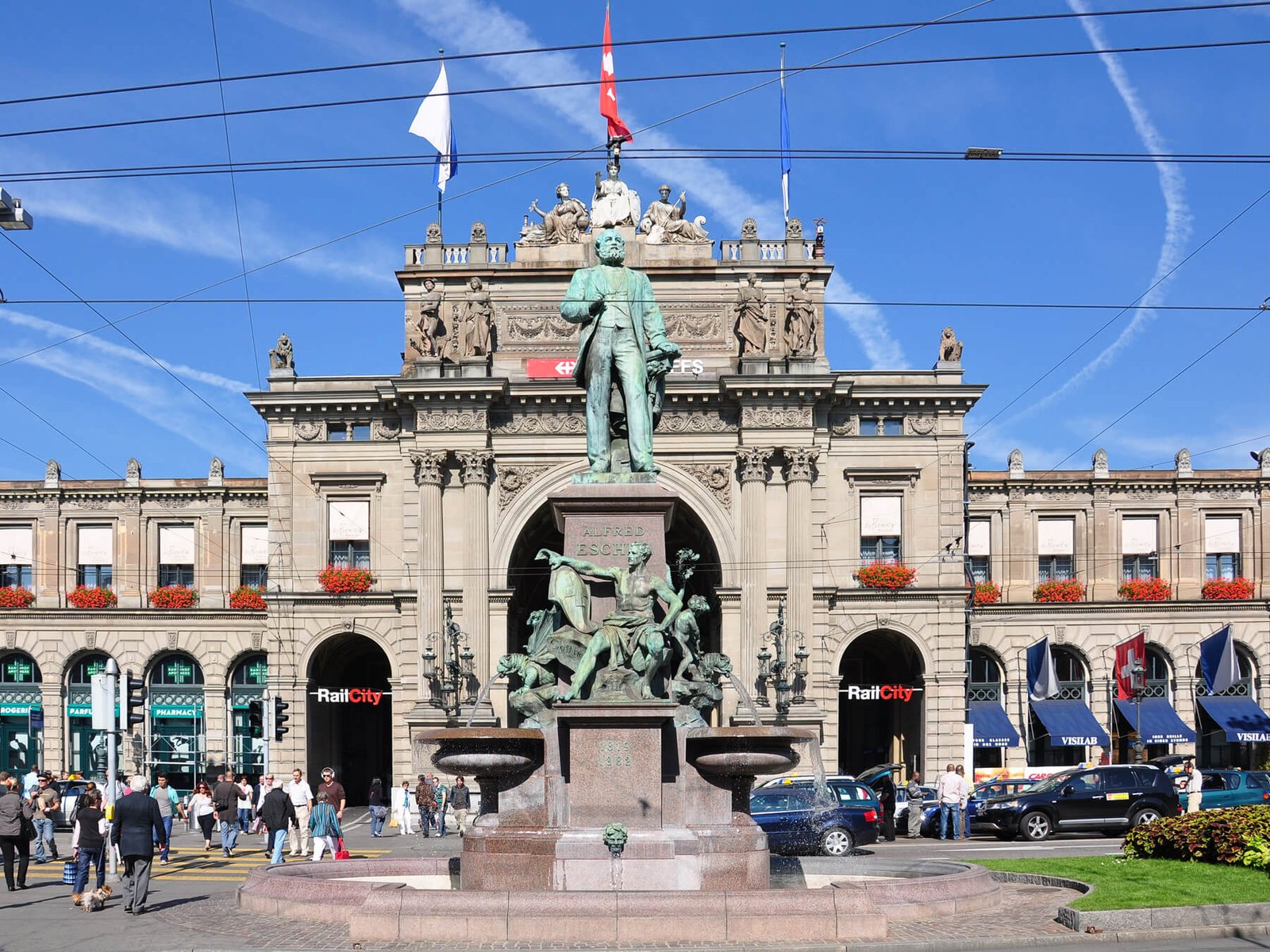 Monument to Alfred Escher in front of the entrance to the Hauptbahnhof Monument to Alfred Escher, the founder of railways