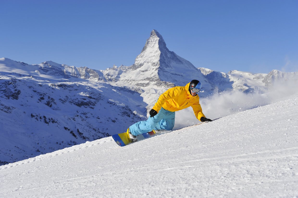 Photo of a snowboarder Zermatt, Switzerland Snowboarding in Zermatt