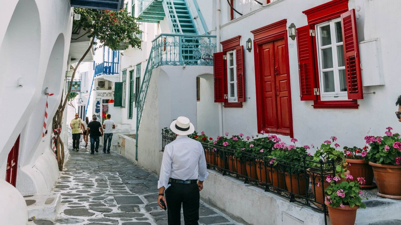 Photo of the narrow street of Matogianni with white houses Matogianni street