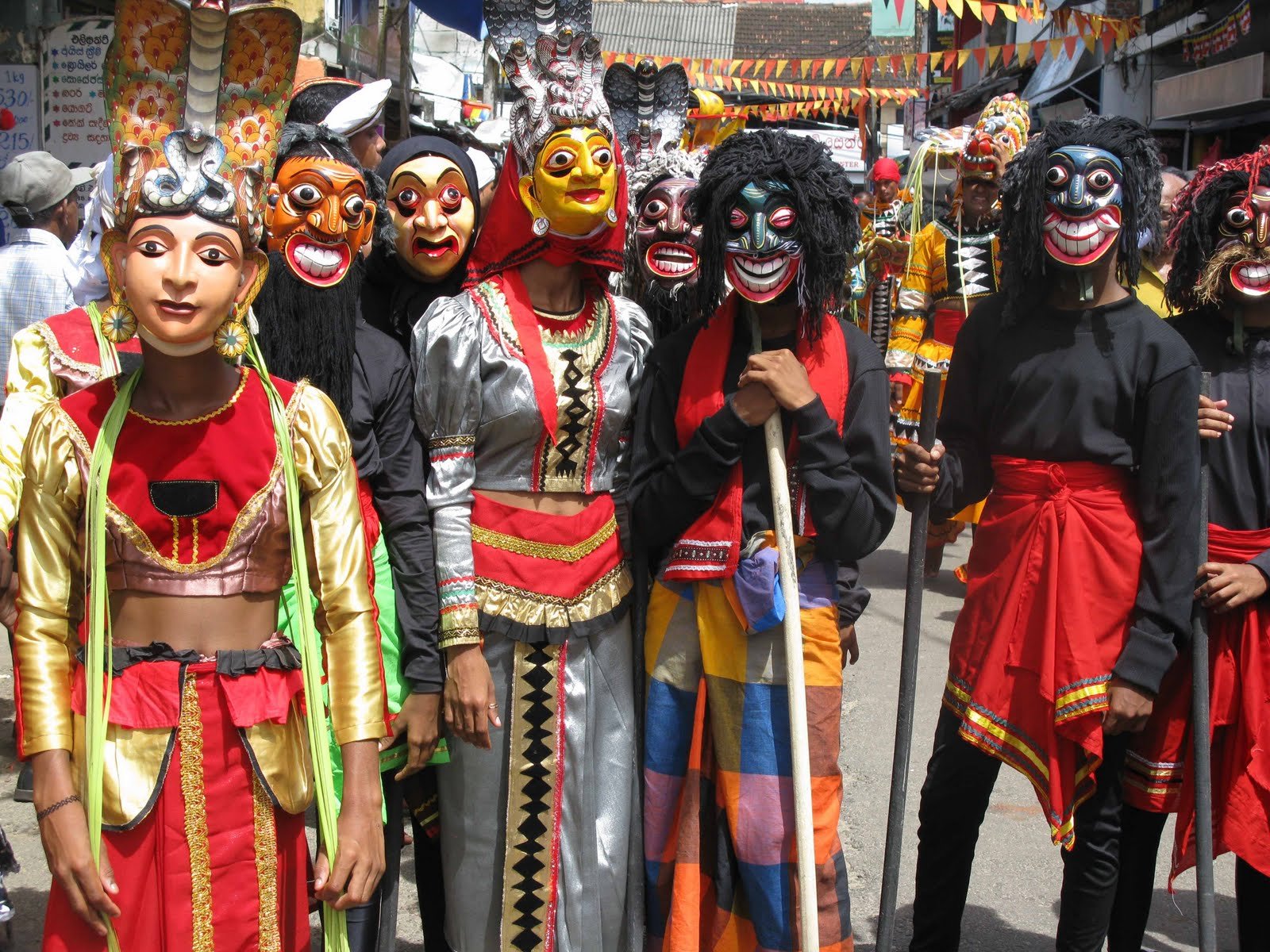 Ambalangoda festival where locals wear wooden masks Photo: Sri Lankans in wooden masks