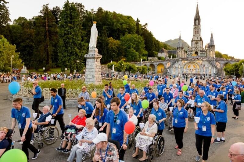 Volunteers help disabled people in Lourdes, France Volunteering in Lourdes