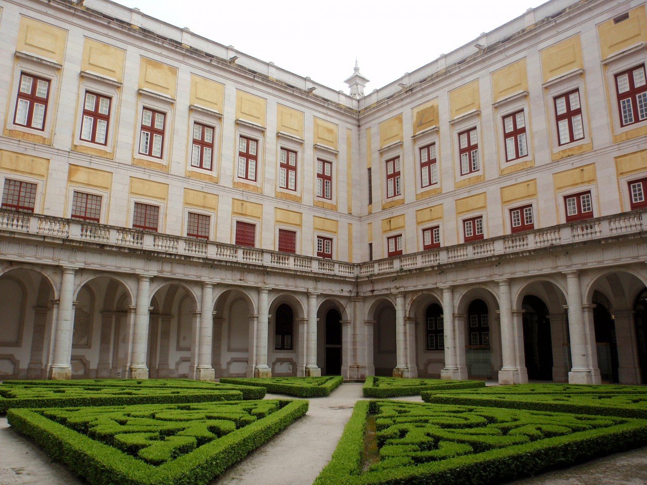 Courtyard with flowerbed in the palace of the city of Mafra Courtyard of the palace