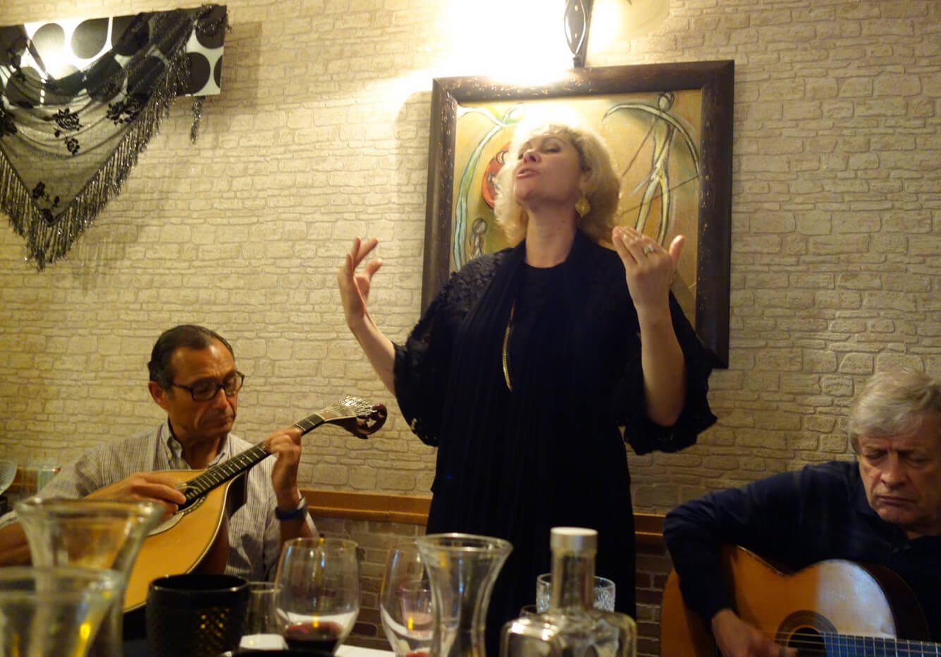 Woman singing fado at the restaurant Sr.Fado de Alfama Live music at the restaurant Sr.Fado de Alfama