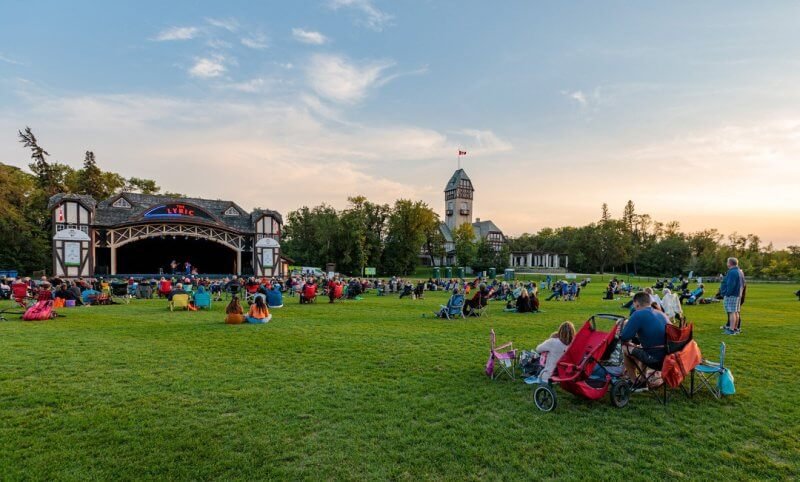 Part of Assiniboine Park People on the lawn at Assiniboine Park, Winnipeg, Manitoba