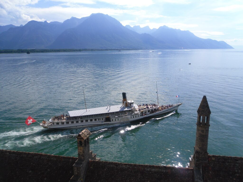 Photo of a boat passing through Chillon Castle By boat to the Chillon stop