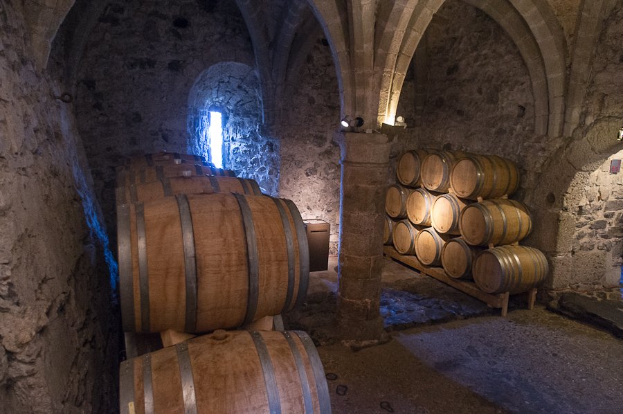Photos of wine barrels in Chillon Castle Storage and production of local wine varieties
