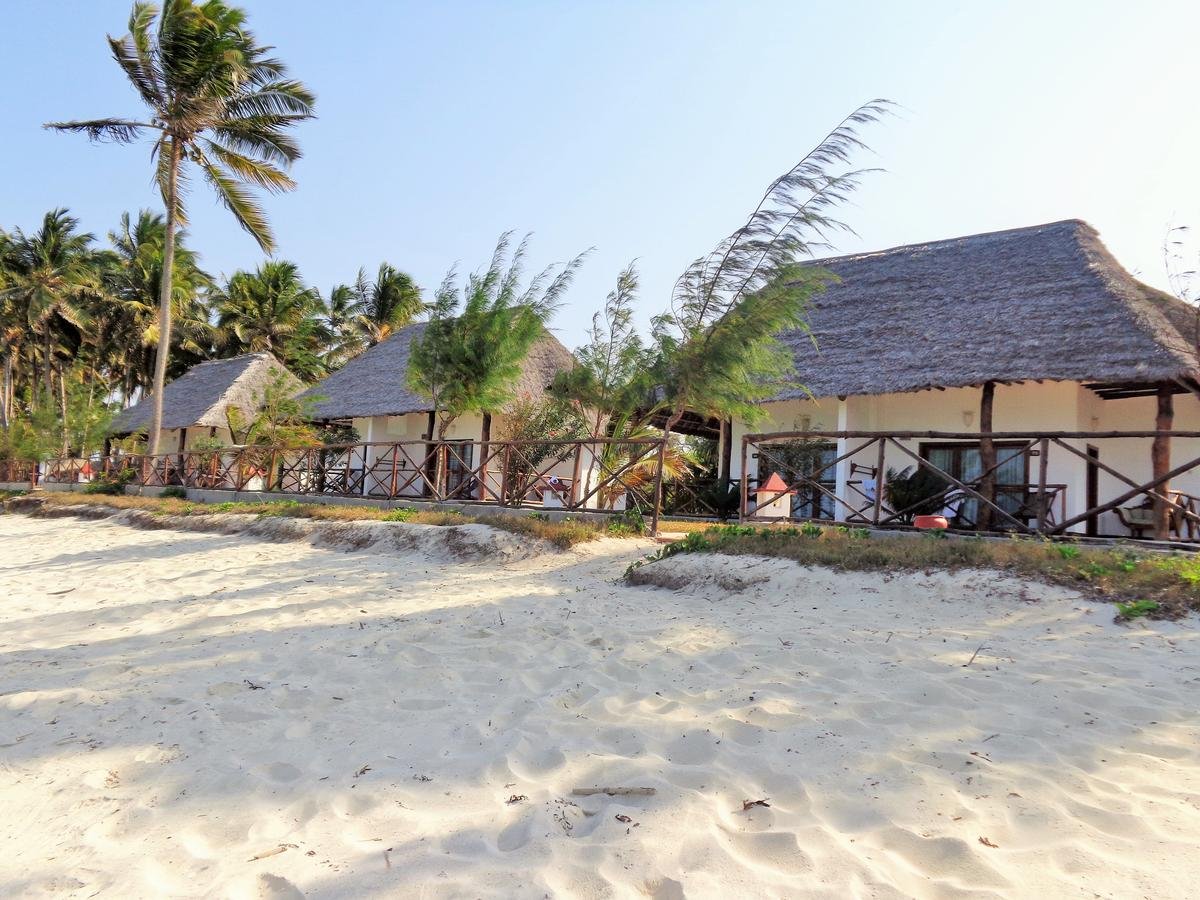 Pictured is an oceanfront bungalow in Zanzibar Lots of oceanfront bungalows