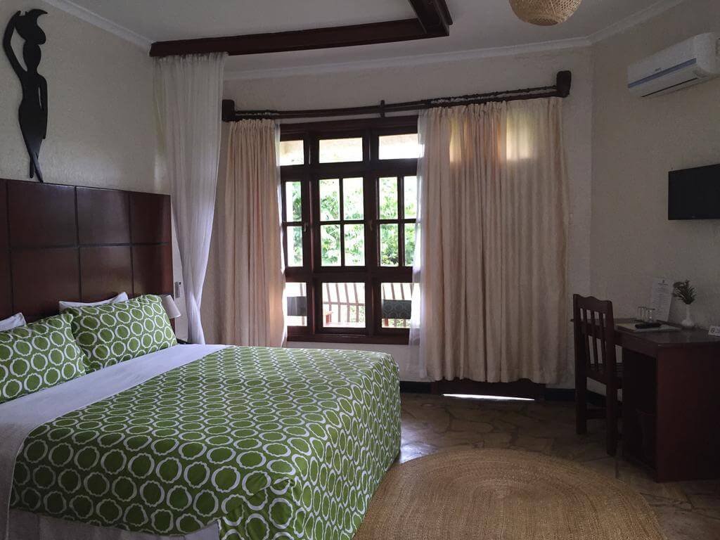 Interior photo of a room at the Arusha Planet Lodge Hotel Room at the 3* Arusha Planet Lodge Hotel