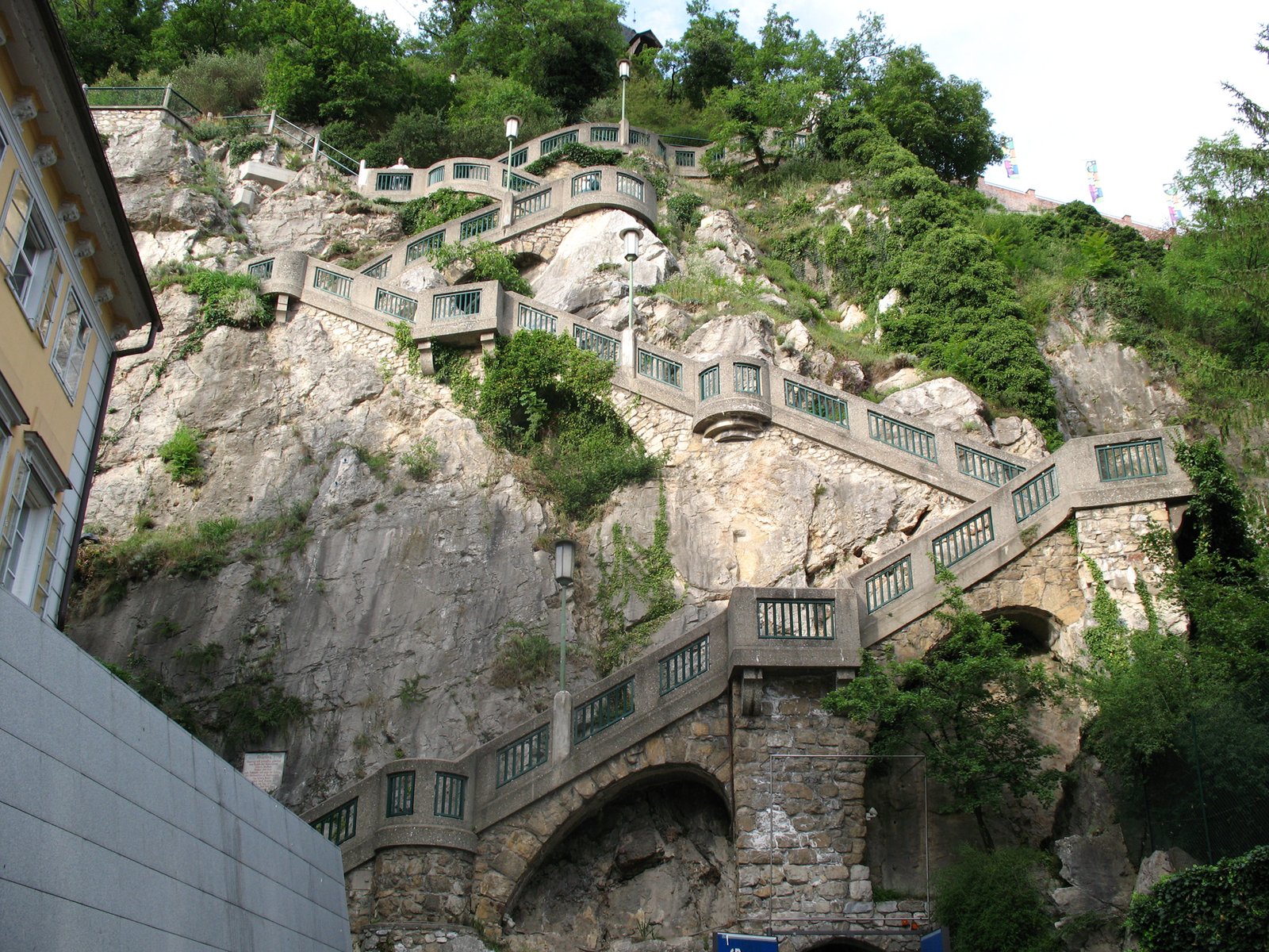 Stairs on the rocky slope of Mount Schlossberg Schlossberg Mountain climb
