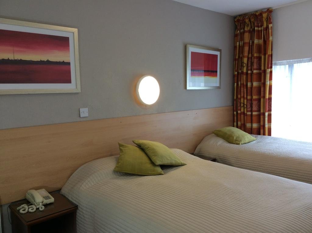 Interior photo of the Ashley Hotel room Ashley Hotel Room