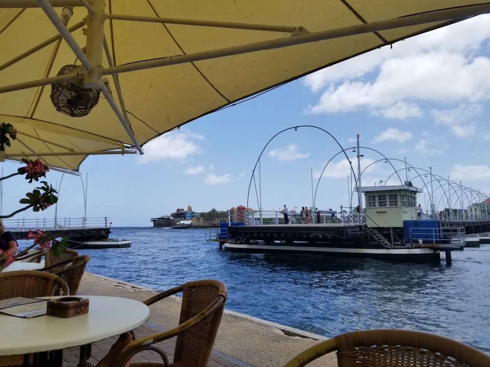 In the photo, Queen Emma's pontoon bridge is moving in different directions Queen Emma's Bridge is splitting in two