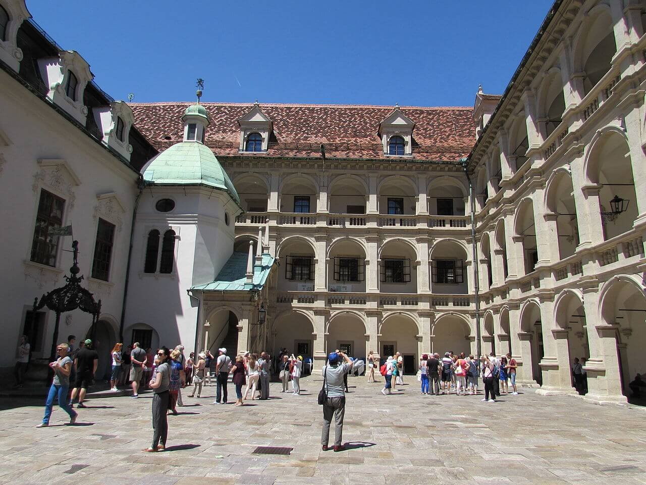 Tourists in the courtyard of the Styrian Parliament in Graz Inner courtyard