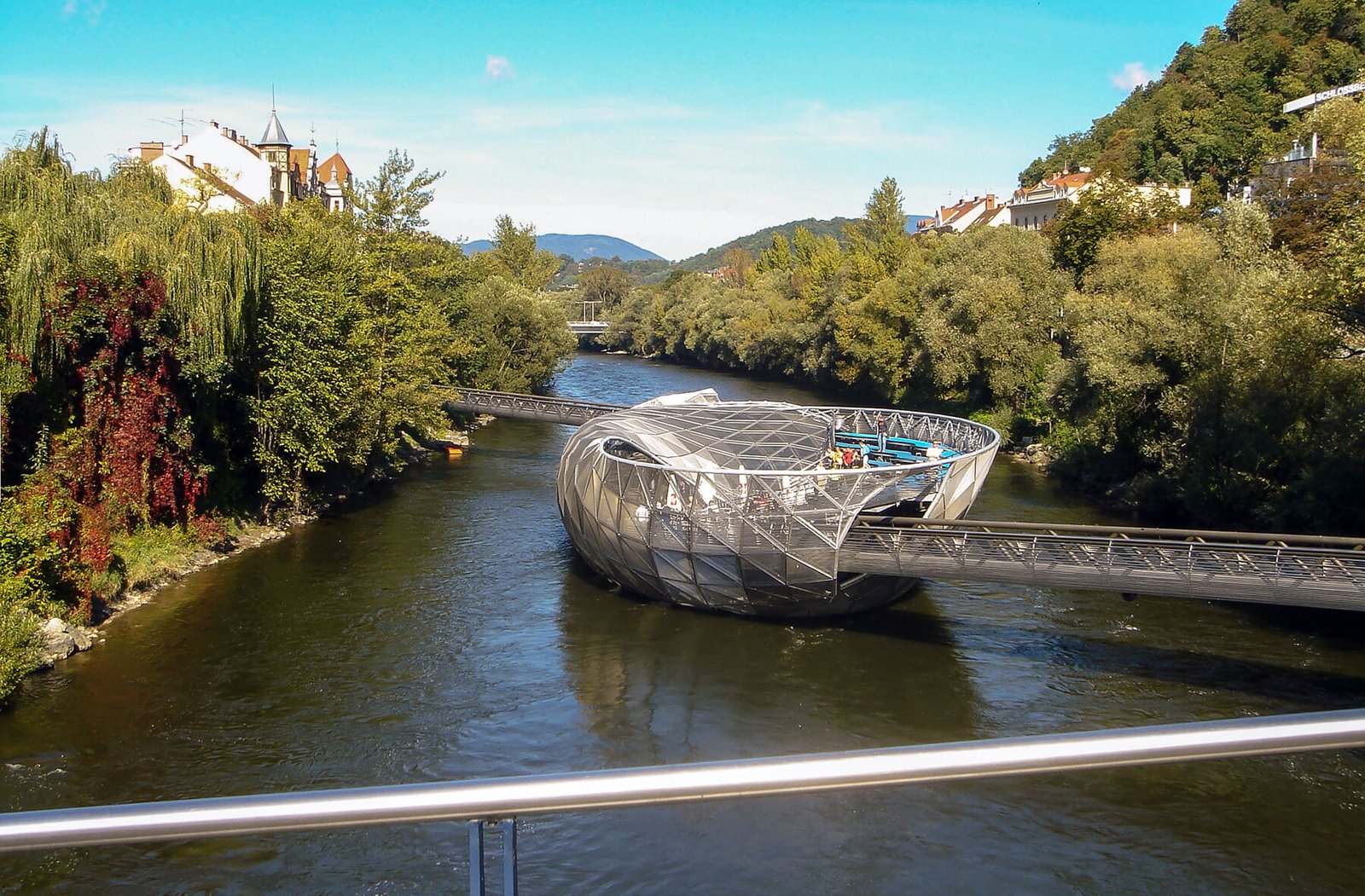 A glass and iron island on the River Mur in Graz, Austria Floating Moore Island