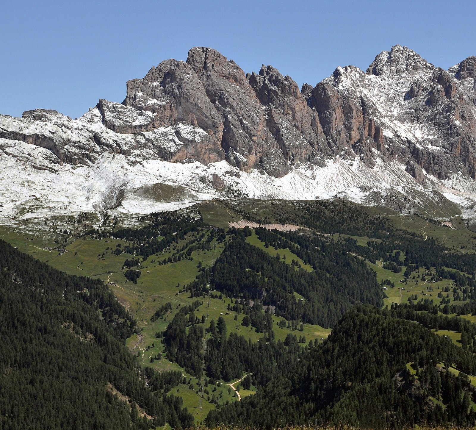 Meadows of Mastlé and Col Raiser beneath the Odle peaks near Santa Cristina