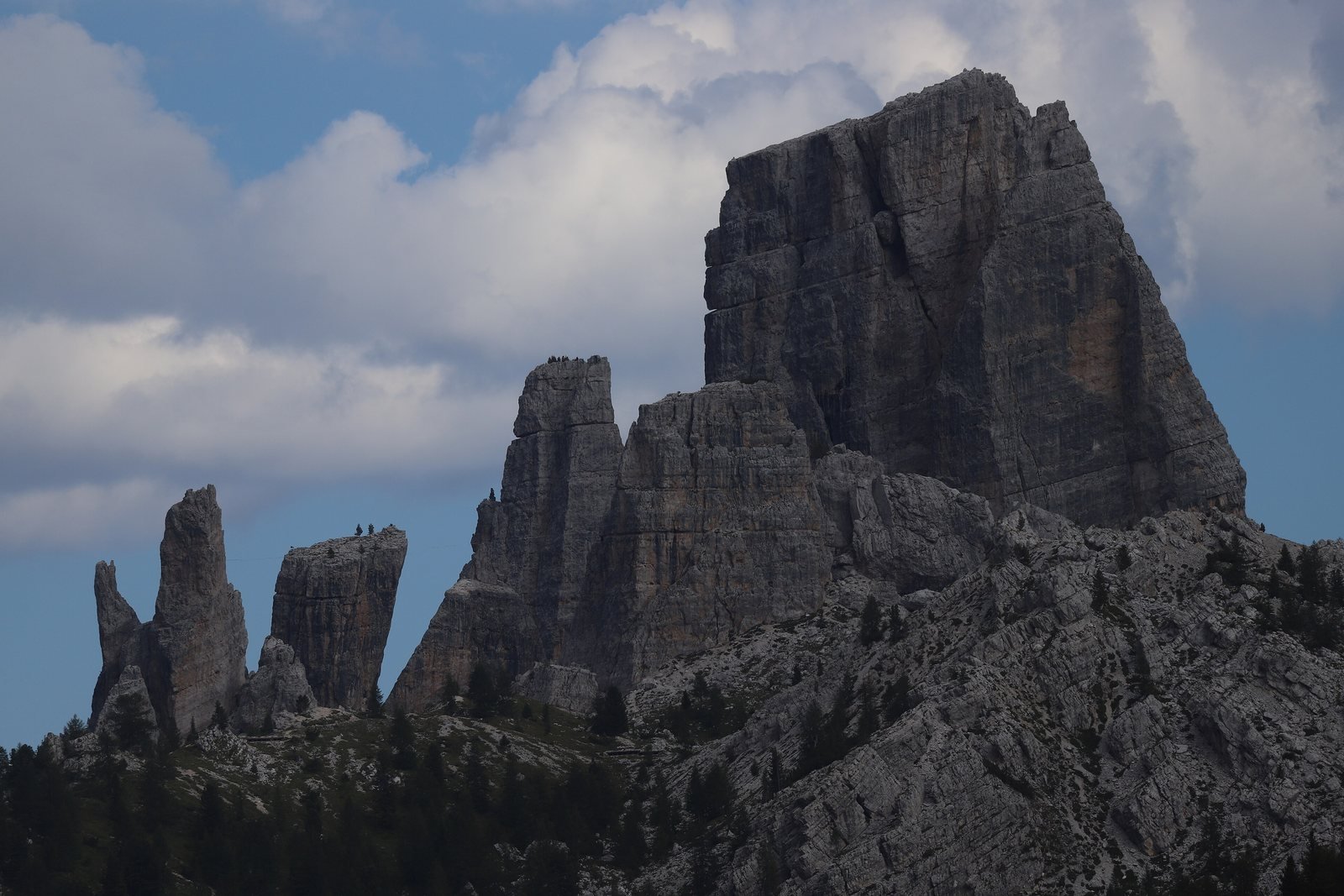 The Cinque Torri rock towers under summer clouds near Cortina d'Ampezzo