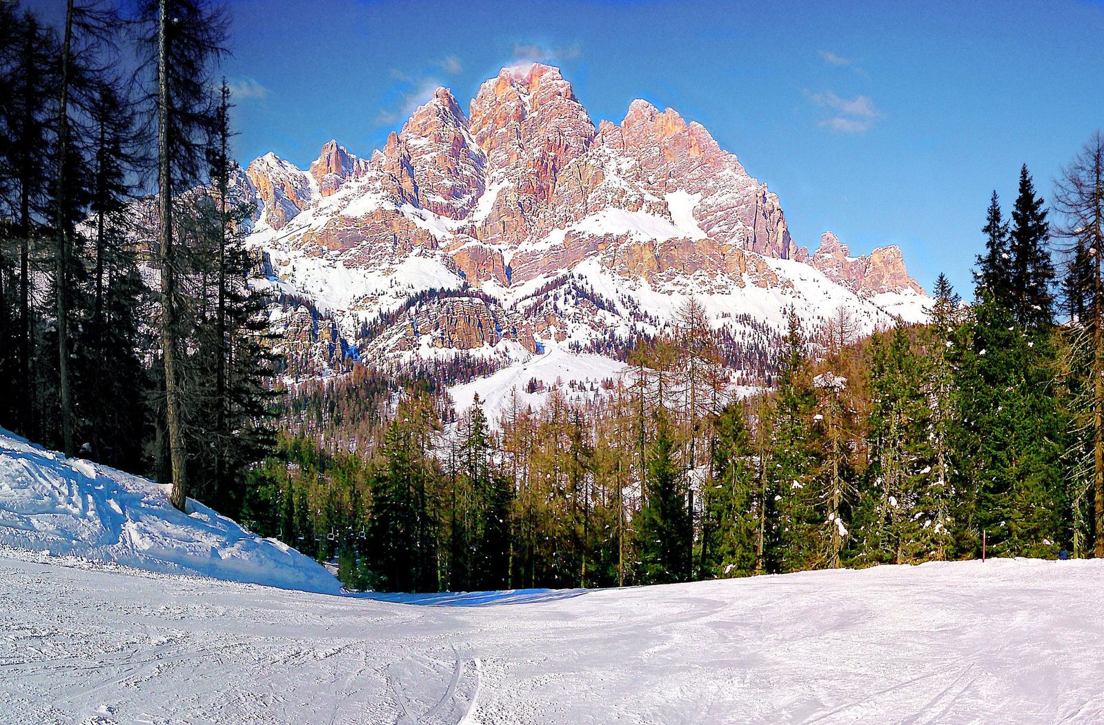 Groomed ski piste below Monte Cristallo and Piz Popena near Cortina d'Ampezzo