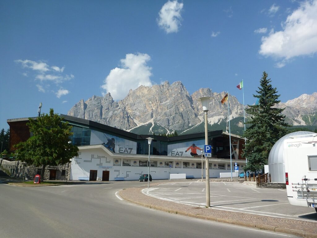 The Stadio Olimpico del Ghiaccio, Cortina d'Ampezzo's Olympic Ice Stadium, below the Dolomites