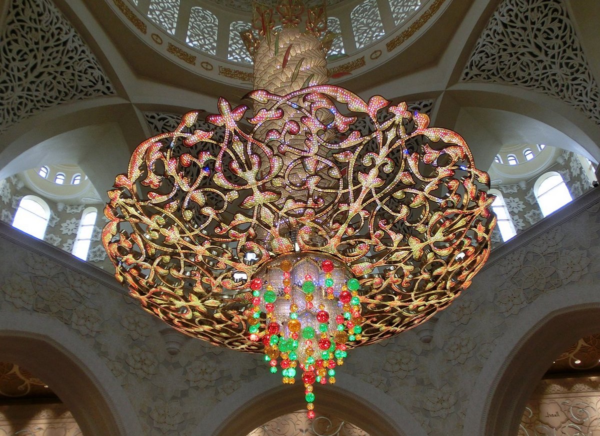 Photo of a chandelier inlaid with Swarovski crystals in the Sheikh Zayed Mosque The world's second largest chandelier is encrusted with Swarovski crystals